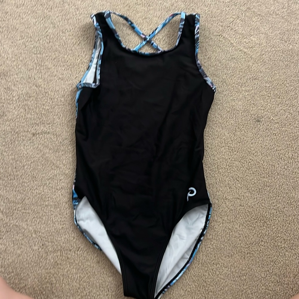 Plum gymnastics leotard size adult small. In great condition.